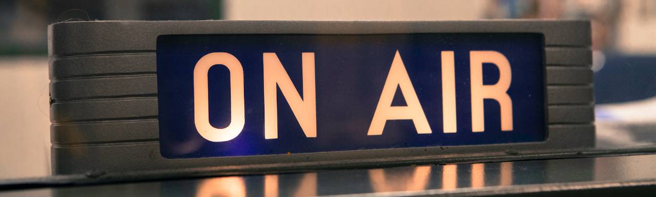 Photo of an "on air" sign.